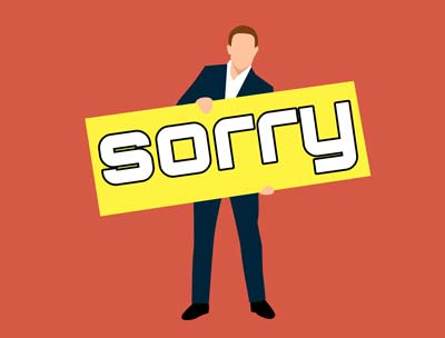 A digitally drawn figure of a man holding up a signboard with sorry written in it.